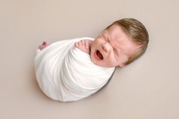 newborn-baby-yawning-newborn-photographers-photoshoot.jpg
