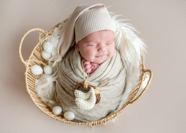 newborn-baby-easter-style-basket-with-eggs-newborn-photographer-photoshoot.jpg