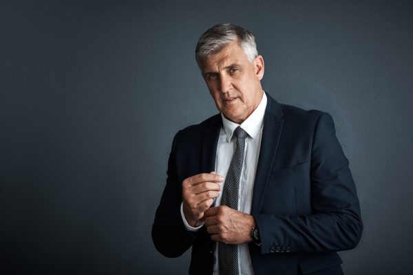 portrait-businessman-advocate-studio-with-confidence-executive-management-law-career-mature-person-attorney-expertise-legal-aid-policy-ambition-space-dark-background.jpg