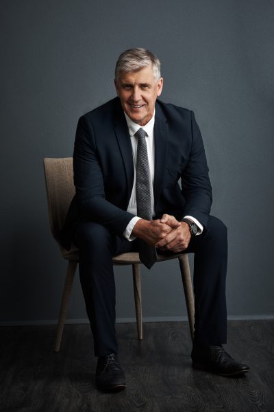 portrait-mature-businessman-studio-with-smile-finance-career-executive-management-job-confident-happy-person-financial-entrepreneur-with-pride-ambition-growth-dark-background.jpg