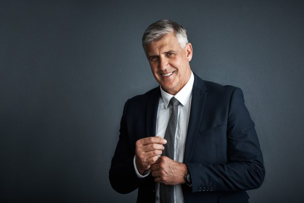 portrait-businessman-lawyer-studio-with-smile-advocacy-career-legal-aid-insight-justice-confident-mature-person-attorney-with-pride-law-expertise-space-dark-background.jpg