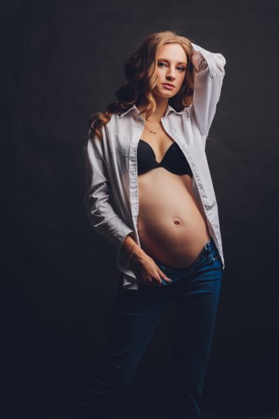 young-beautiful-stylish-pregnant-woman-posing-black-underwear.jpg