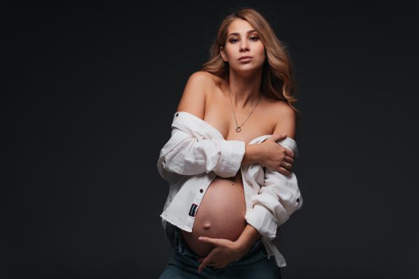 young-beautiful-pregnant-woman-white-shirt.jpg