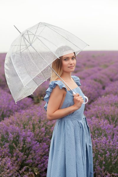 transparent-umbrella-woman-dancing-rain-lavender-field-blue-wet-dress-4.jpg