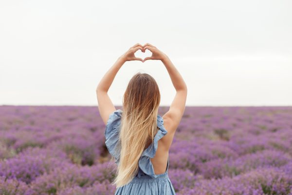 blonde-woman-rain-lavender-field-provence-gathering-flowers-into-wicker-bag-5.jpg