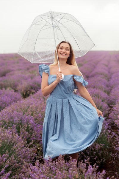 transparent-umbrella-woman-dancing-rain-lavender-field-blue-wet-dress-2.jpg