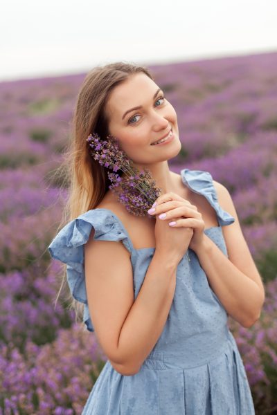 blonde-woman-rain-lavender-field-provence-gathering-flowers-into-wicker-bag-4.jpg